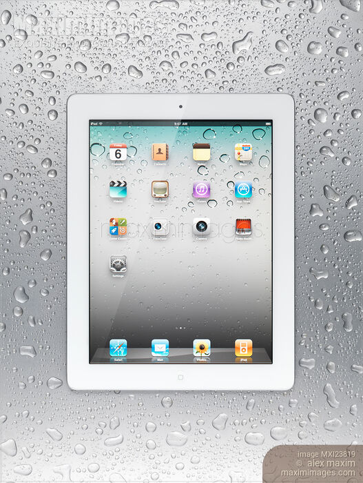 Stock photo of Apple iPad 2 Tablet Computer on Metal Background Buy commercial use license at MaximImages