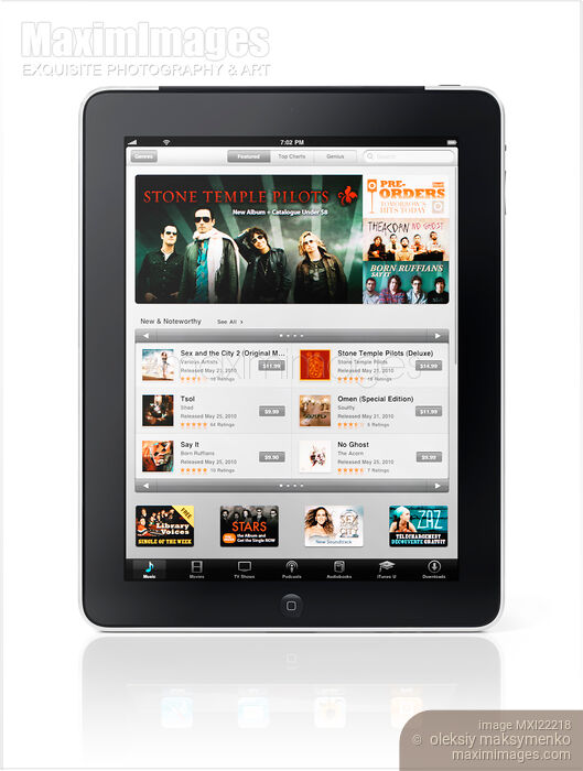 Apple iPad 3G Tablet Displaying iTunes Store Stock photo of Apple iPad 3G Tablet Displaying iTunes Store Buy commercial use license at MaximImages