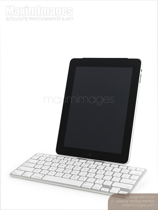 Apple iPad 3G Tablet with a Keyboard Stock photo of Apple iPad 3G Tablet with a Keyboard Buy commercial use license at MaximImages