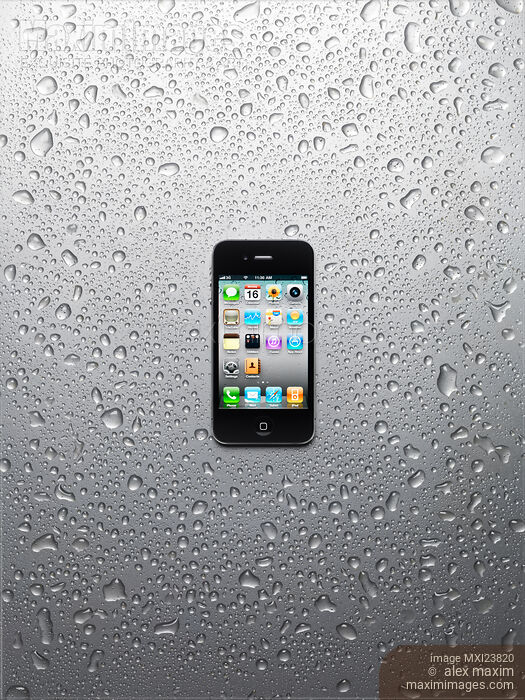 Apple iPhone 4 Smartphone on Wet Metal Stock photo of Apple iPhone 4 Smartphone on Wet Metal Buy commercial use license at MaximImages