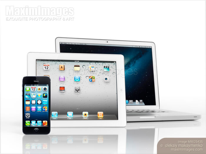 Stock photo of Apple iPhone iPad and Macbook Pro devices Buy commercial use license at MaximImages