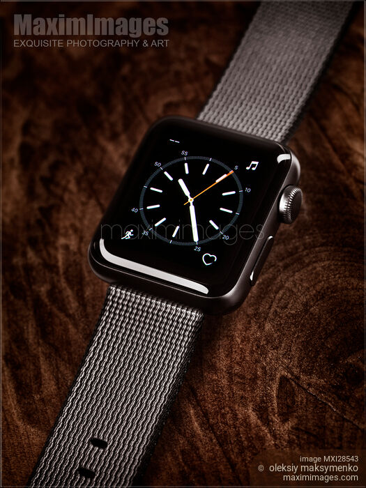 Apple Watch smartwatch on wood Stock photo of Apple Watch smartwatch on wood Buy commercial use license at MaximImages