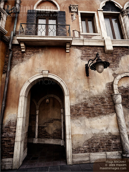 Stock photo of Arched passage in old rustic Venetian house Buy commercial use license at MaximImages