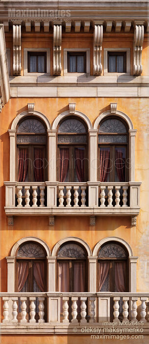 Stock photo of Arched windows of Venetian house Buy commercial use license at MaximImages