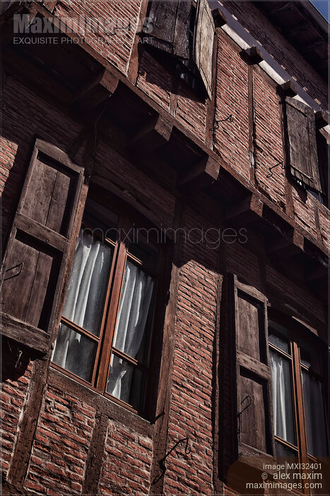 Stock photo of Architectural detail of medieval brick French houses in Albi South of France Buy commercial use license at MaximImages