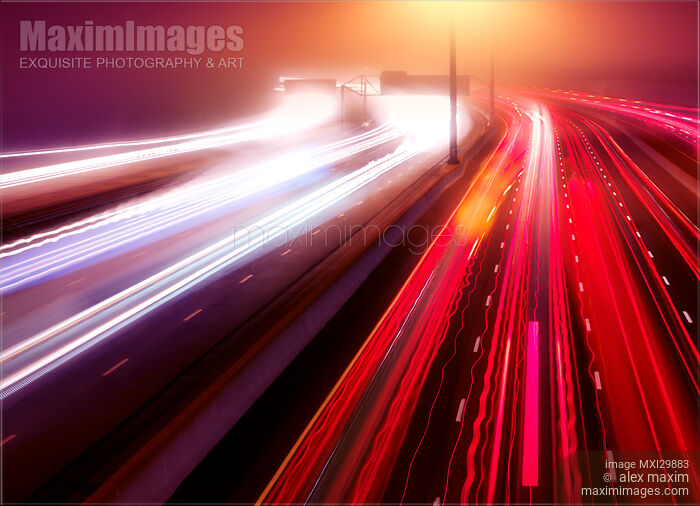 Artistic abstract highway traffic light trails in fog at nighttime Stock photo of Artistic abstract highway traffic light trails in fog at nighttime Buy commercial use license at MaximImages