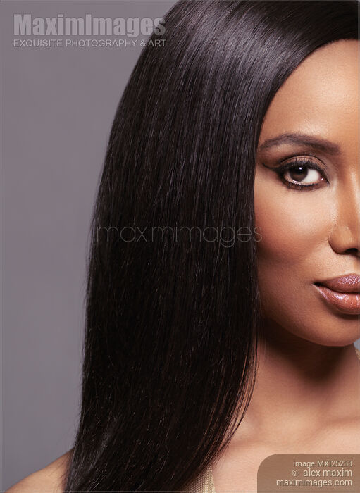 Artistic beauty portrait of black woman face with long straight hair Stock photo of Artistic beauty portrait of black woman face with long straight hair Buy commercial use license at MaximImages
