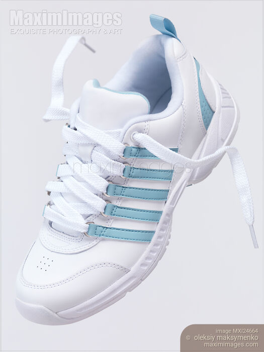 Stock photo of Artistic closeup of a sports shoe Buy commercial use license at MaximImages