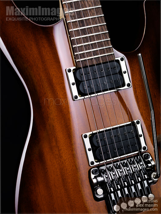 Stock photo of Artistic closeup of electric guitar Buy commercial use license at MaximImages