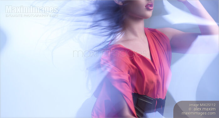 Artistic dynamic photo of young woman Stock photo of Artistic dynamic photo of young woman Buy commercial use license at MaximImages