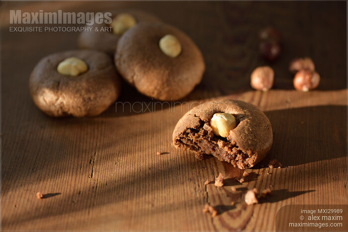 Artistic food still life of home-made Hazelnut butter cookies on rustic wood Stock photo of Artistic food still life of home-made Hazelnut butter cookies on rustic wood Buy commercial use license at MaximImages