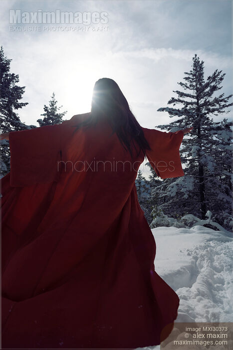 Artistic photo of a beautiful asian woman in red undone kimono running in the snow Stock photo of Artistic photo of a beautiful asian woman in red undone kimono running in the snow Buy commercial use license at MaximImages