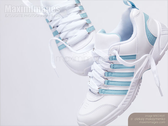 Stock photo of Artsitic close up of white sneakers Buy commercial use license at MaximImages