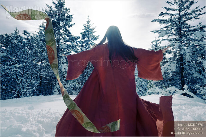 Asian woman in red kimono dancing in the snow spinning around tossing her clothes away Stock photo of Asian woman in red kimono dancing in the snow spinning around tossing her clothes away Buy commercial use license at MaximImages