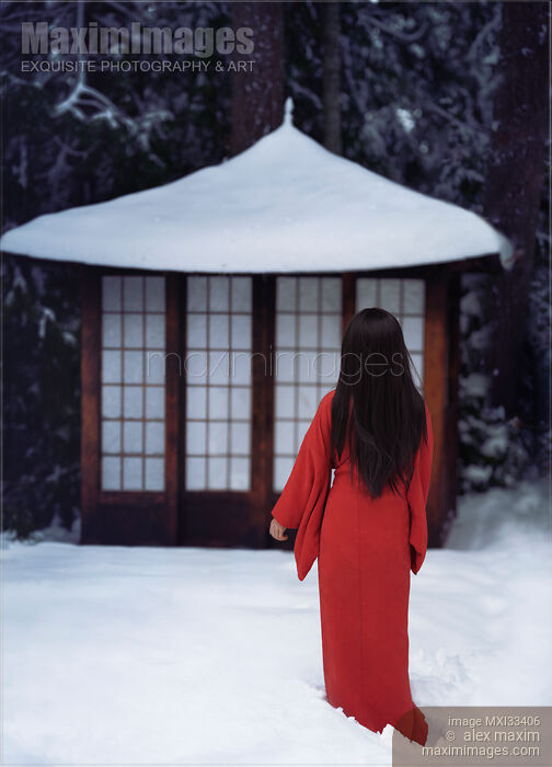 Asian woman in red kimono standing in white snow looking at a little traditional Japanese house or temple Stock photo of Asian woman in red kimono standing in white snow looking at a little traditional Japanese house or temple Buy commercial use license at MaximImages