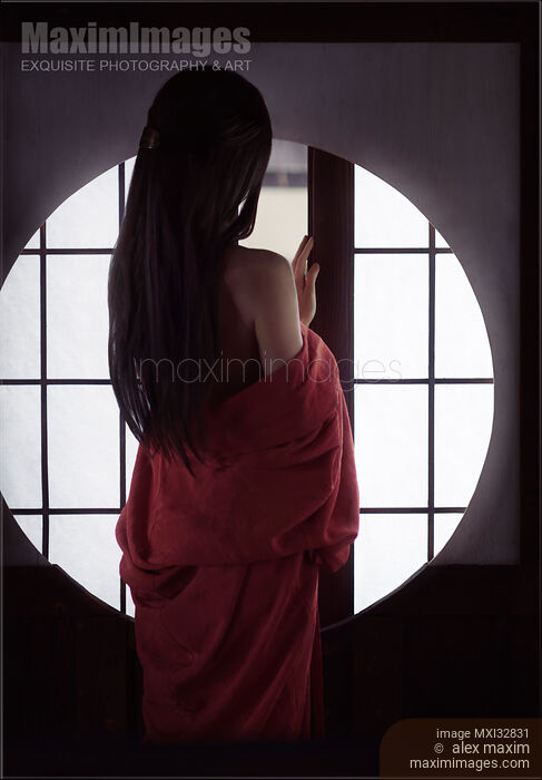 Asian woman in undone red kimono standing by a shoji window of a Japanese house Sensual portrait Stock photo of Asian woman in undone red kimono standing by a shoji window of a Japanese house Sensual portrait Buy commercial use license at MaximImages