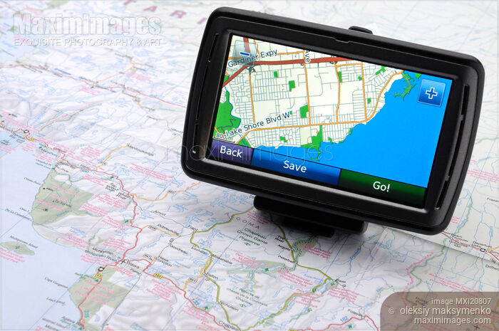 Automotive GPS on a road map Stock photo of Automotive GPS on a road map Buy commercial use license at MaximImages