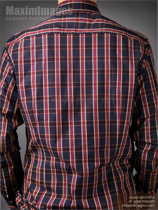 Stock photo of Back of a man wearing dark red tartan shirt Buy commercial use license at MaximImages