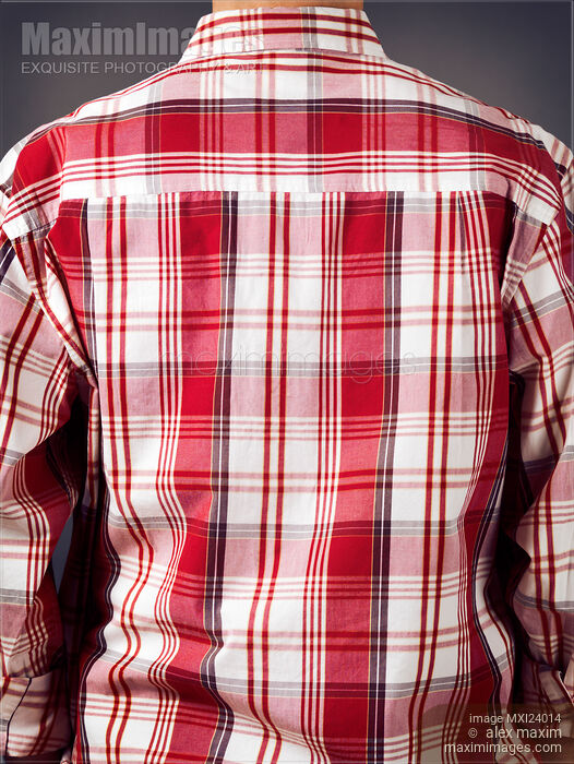 Stock photo of Back of a man wearing red tartan shirt Buy commercial use license at MaximImages