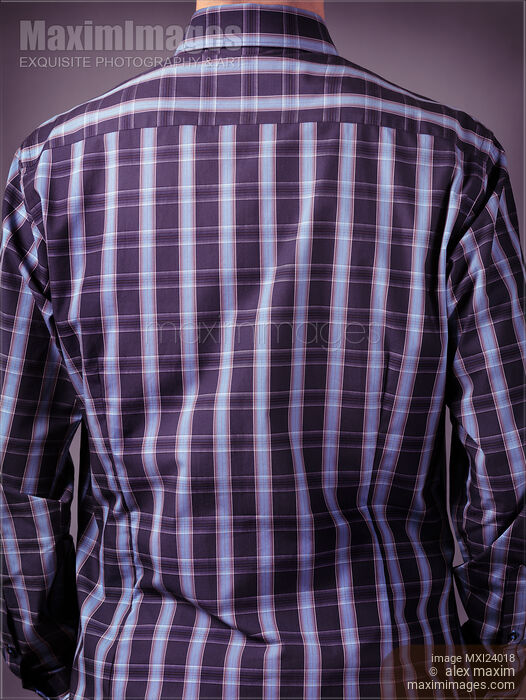 Stock photo of Back of a man wearing stylish blue tartan shirt Buy commercial use license at MaximImages