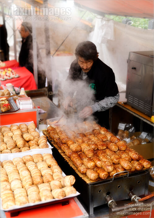 Bacon wrapped rice balls Nikumaki Onigiri Japanese street food in Kyoto Stock photo of Bacon wrapped rice balls Nikumaki Onigiri Japanese street food in Kyoto Buy commercial use license at MaximImages