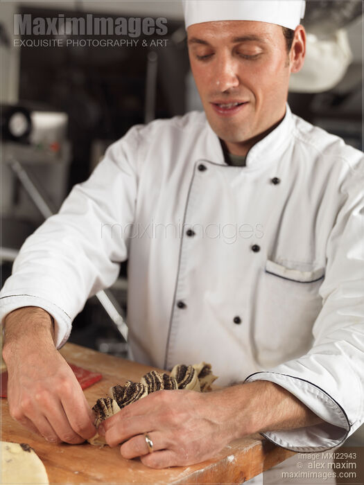 Stock photo of Baker Making Pastries Buy commercial use license at MaximImages
