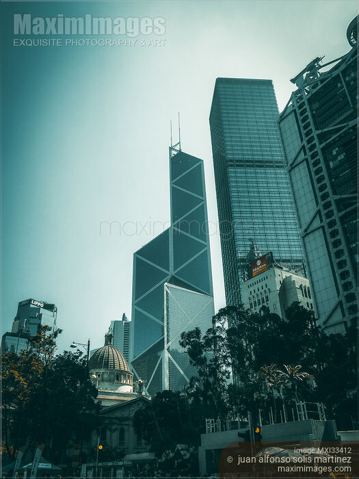 Stock photo of Bank of China Tower and modern buildings on streets of Hong Kong Buy commercial use license at MaximImages