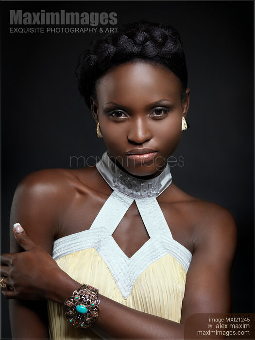 Beautiful african american woman face portrait Stock photo of Beautiful african american woman face portrait Buy commercial use license at MaximImages