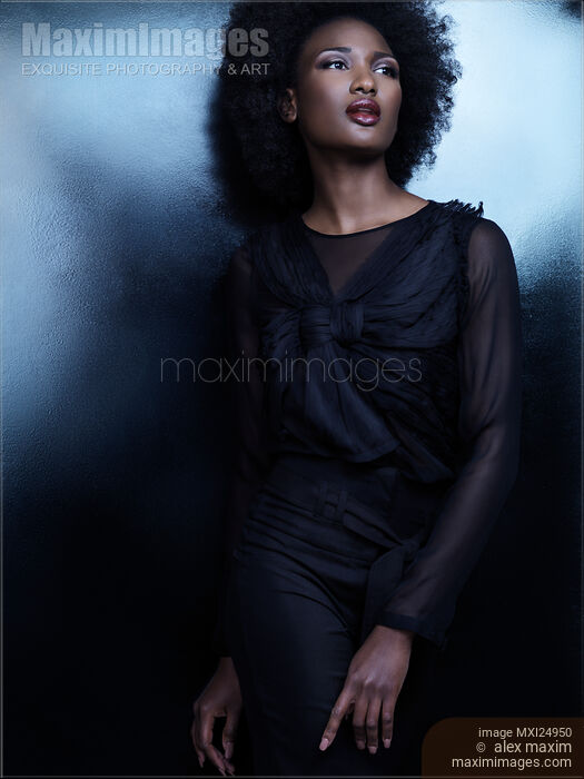 Beautiful african american woman in black clothes Stock photo of Beautiful african american woman in black clothes Buy commercial use license at MaximImages