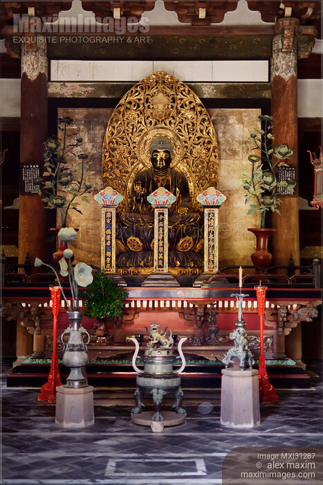 Stock photo of Beautiful ancient Buddha statue in Butsuden Hall of Daitoku-ji Buddhist temple in Kyoto Buy commercial use license at MaximImages