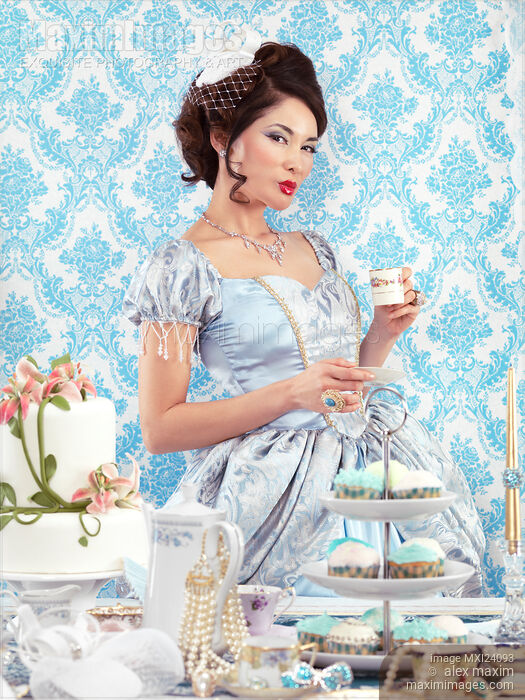 Beautiful asian lady drinking tea Stock photo of Beautiful asian lady drinking tea Buy commercial use license at MaximImages