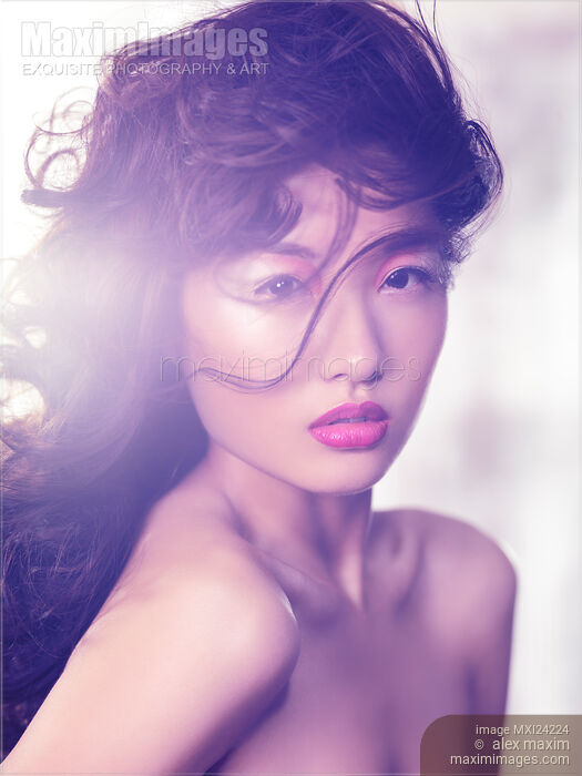 Beautiful asian woman expressive portrait Stock photo of Beautiful asian woman expressive portrait Buy commercial use license at MaximImages