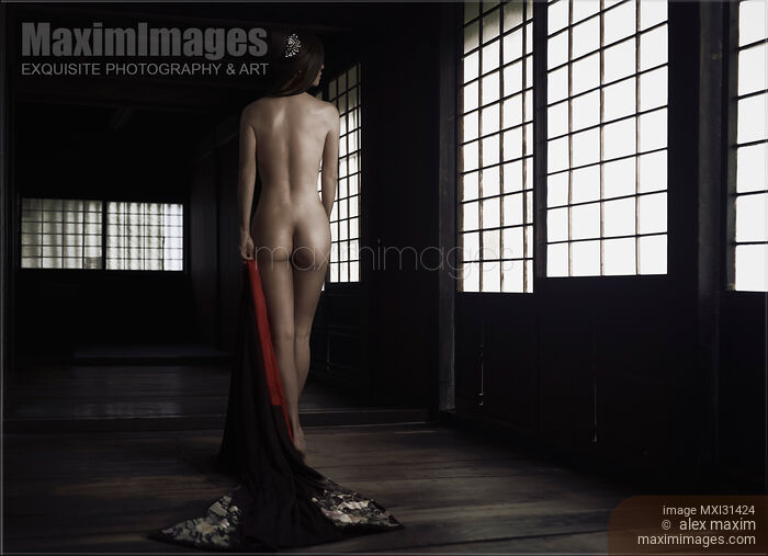 Beautiful asian woman in a Japanese house with her nude back lit by the soft light from shoji doors Art Nudes Stock photo of Beautiful asian woman in a Japanese house with her nude back lit by the soft light from shoji doors Art Nudes Buy commercial use license at MaximImages