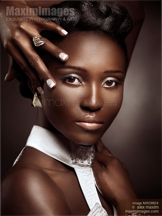 Beautiful black mixed race asian African-american woman closeup of face exotic beauty portrait Stock photo of Beautiful black mixed race asian African-american woman closeup of face exotic beauty portrait Buy commercial use license at MaximImages