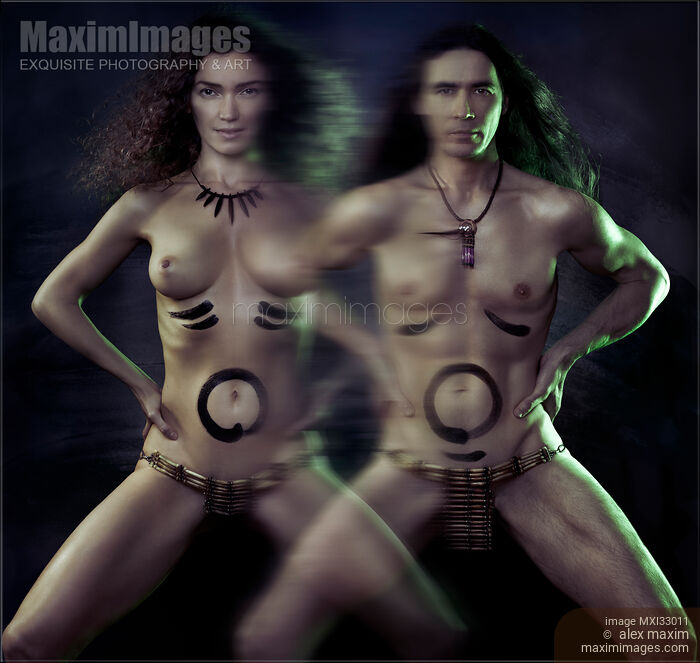 Stock photo of Beautiful couple man and woman shamanic warriors spiritual Tantric fine art concept expressing beauty power health energy sensuality Buy commercial use license at MaximImages