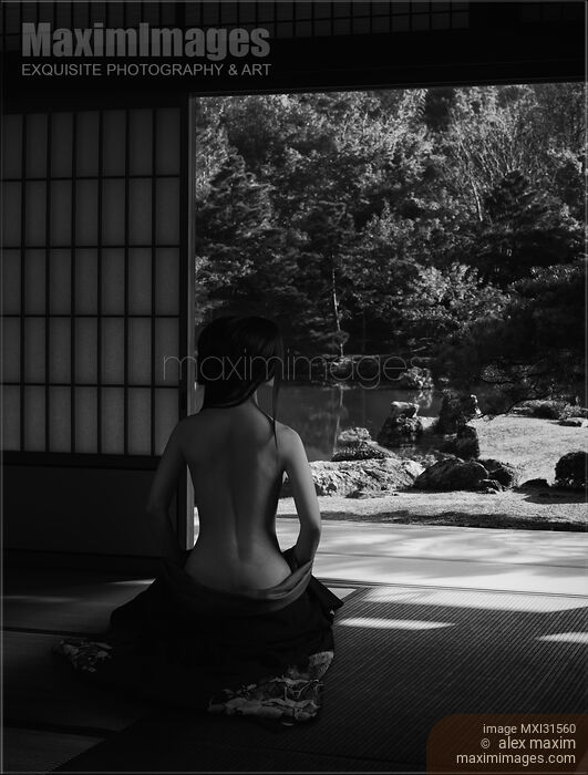 Beautiful half nude asian woman in a Japanese house room with her kimono lowered revealing her naked back Stock photo of Beautiful half nude asian woman in a Japanese house room with her kimono lowered revealing her naked back Buy commercial use license at MaximImages