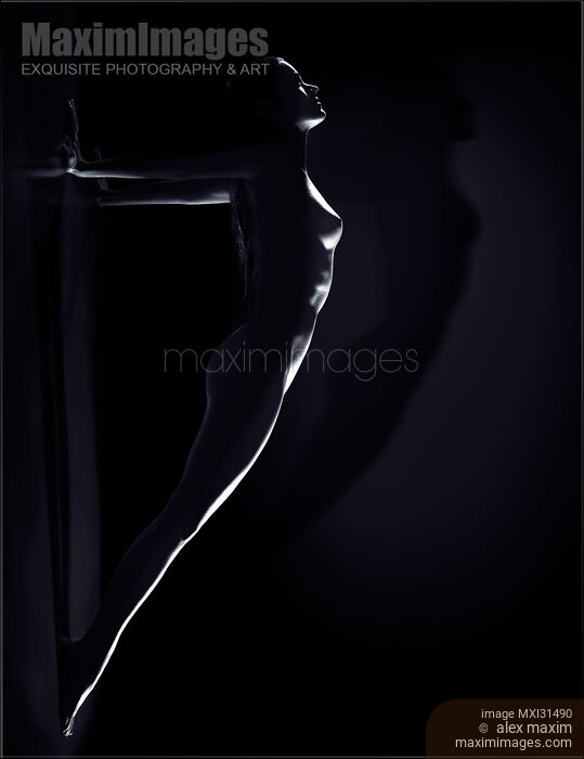 Beautiful naked woman body outline arched in a yoga plank against the wall Inspirational art nude Stock photo of Beautiful naked woman body outline arched in a yoga plank against the wall Inspirational art nude Buy commercial use license at MaximImages