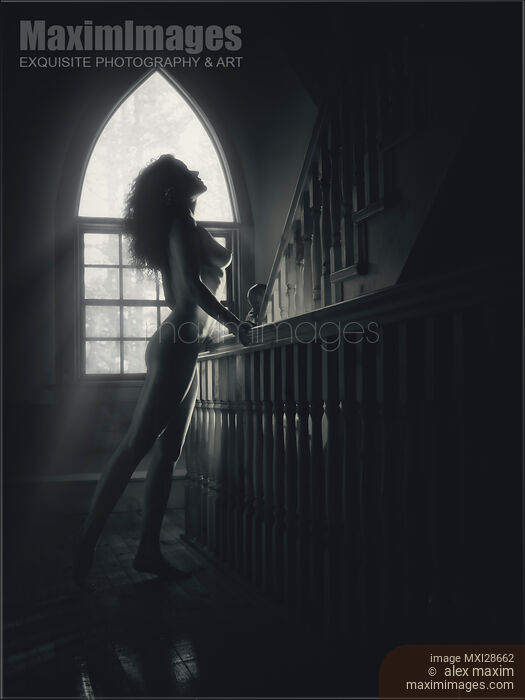 Stock photo of Beautiful naked woman profile sunlit silhouette on staircase Buy commercial use license at MaximImages
