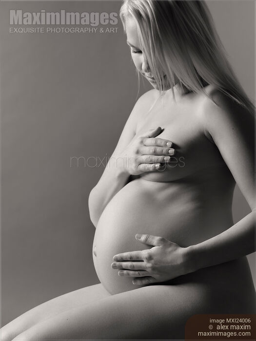 Stock photo of Beautiful nude pregnant woman Buy commercial use license at MaximImages