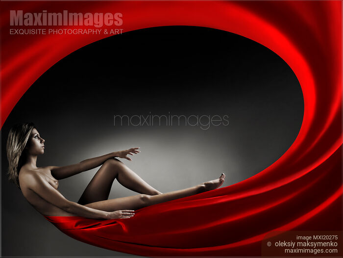 Stock photo of Beautiful Nude Woman in Red Whirl Buy commercial use license at MaximImages