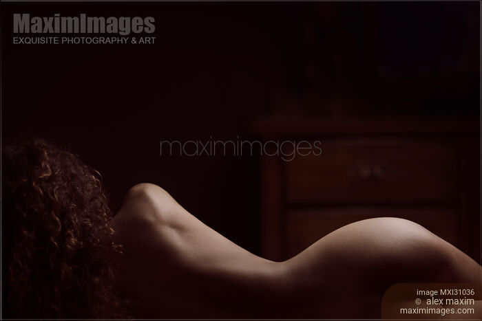 Beautiful outline of a nude woman back silhouette in a dark bedroom Stock photo of Beautiful outline of a nude woman back silhouette in a dark bedroom Buy commercial use license at MaximImages
