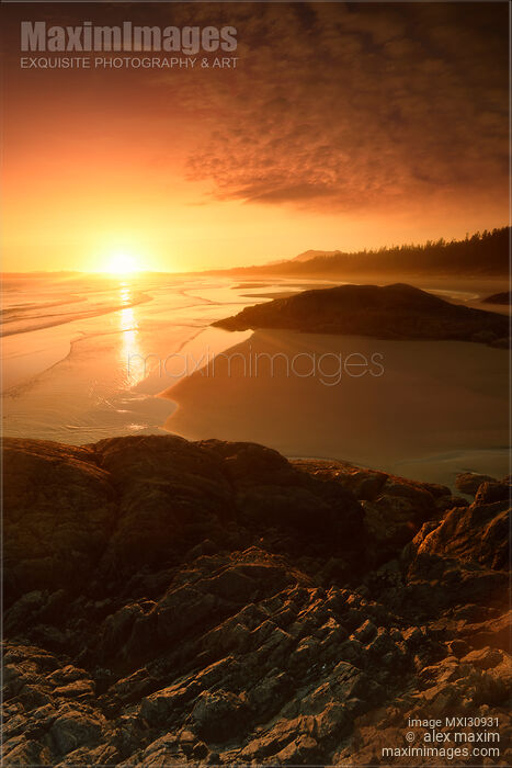 Stock photo of Beautiful scenery in dramatic sunset light at Tofino Pacific Rim National Park ocean beach Buy commercial use license at MaximImages