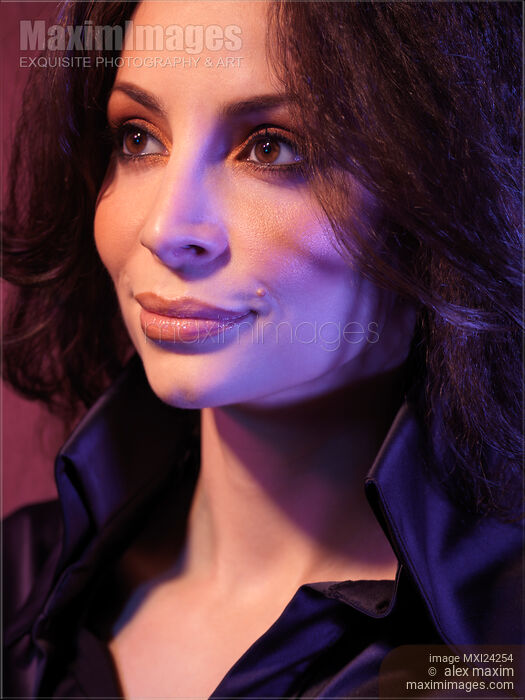 Stock photo of Beautiful smiling woman face expressive portrait Buy commercial use license at MaximImages