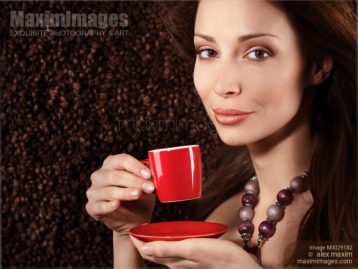 Stock photo of Beautiful smiling woman portrait with a cup of coffee Buy commercial use license at MaximImages