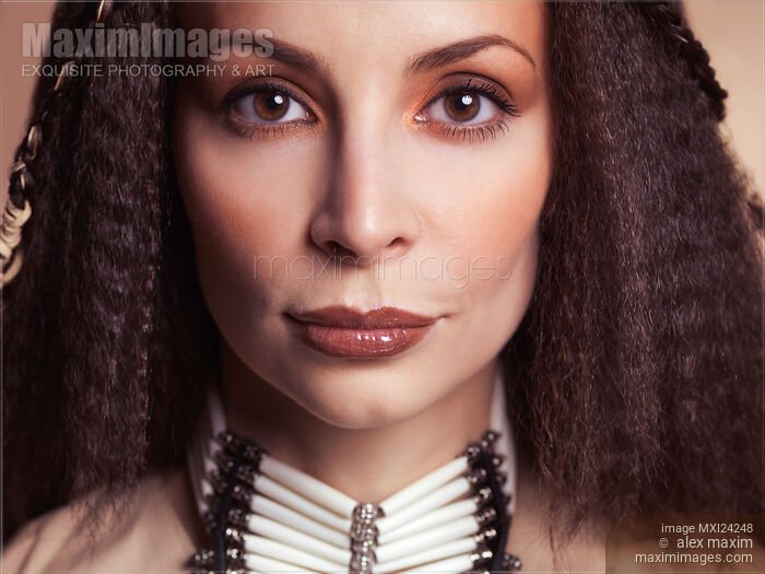 Stock photo of Beautiful woman face portrait Buy commercial use license at MaximImages