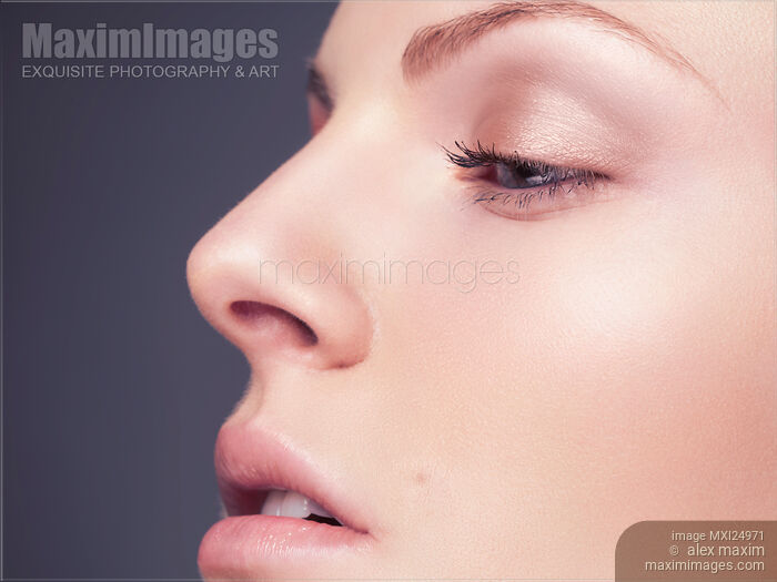 Stock photo of Beautiful woman face profile with clean fresh skin Buy commercial use license at MaximImages
