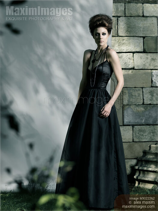 Beautiful Woman in Black Dress Stock photo of Beautiful Woman in Black Dress Buy commercial use license at MaximImages