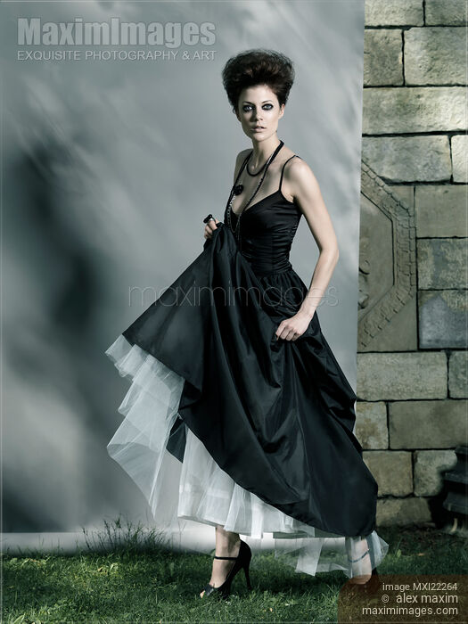 Beautiful Woman in Black Dress Stock photo of Beautiful Woman in Black Dress Buy commercial use license at MaximImages