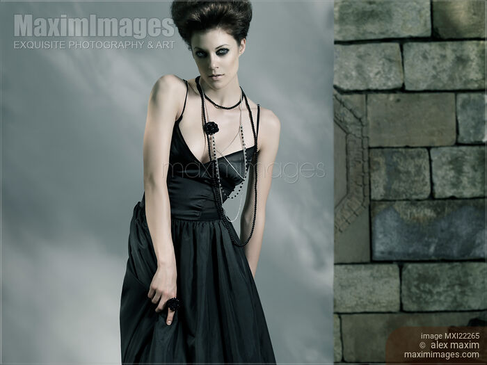 Beautiful Woman in Black Dress Stock photo of Beautiful Woman in Black Dress Buy commercial use license at MaximImages