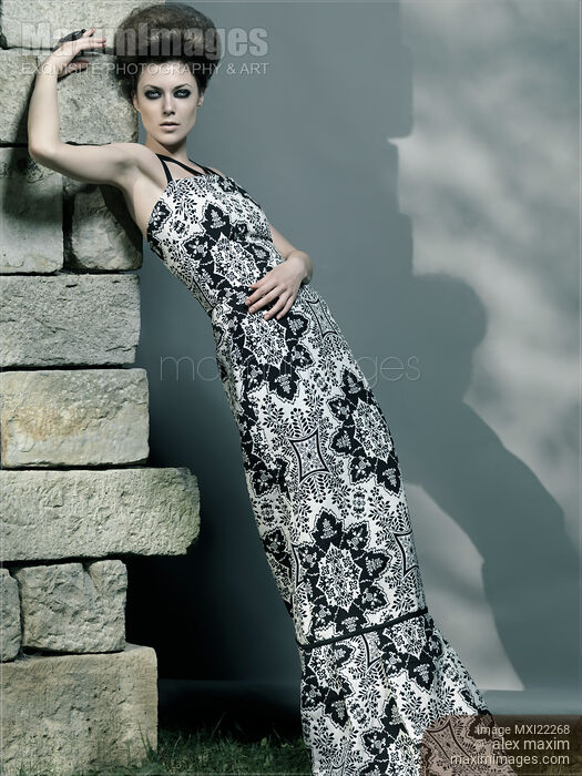 Beautiful Woman in Elegant Dress Stock photo of Beautiful Woman in Elegant Dress Buy commercial use license at MaximImages